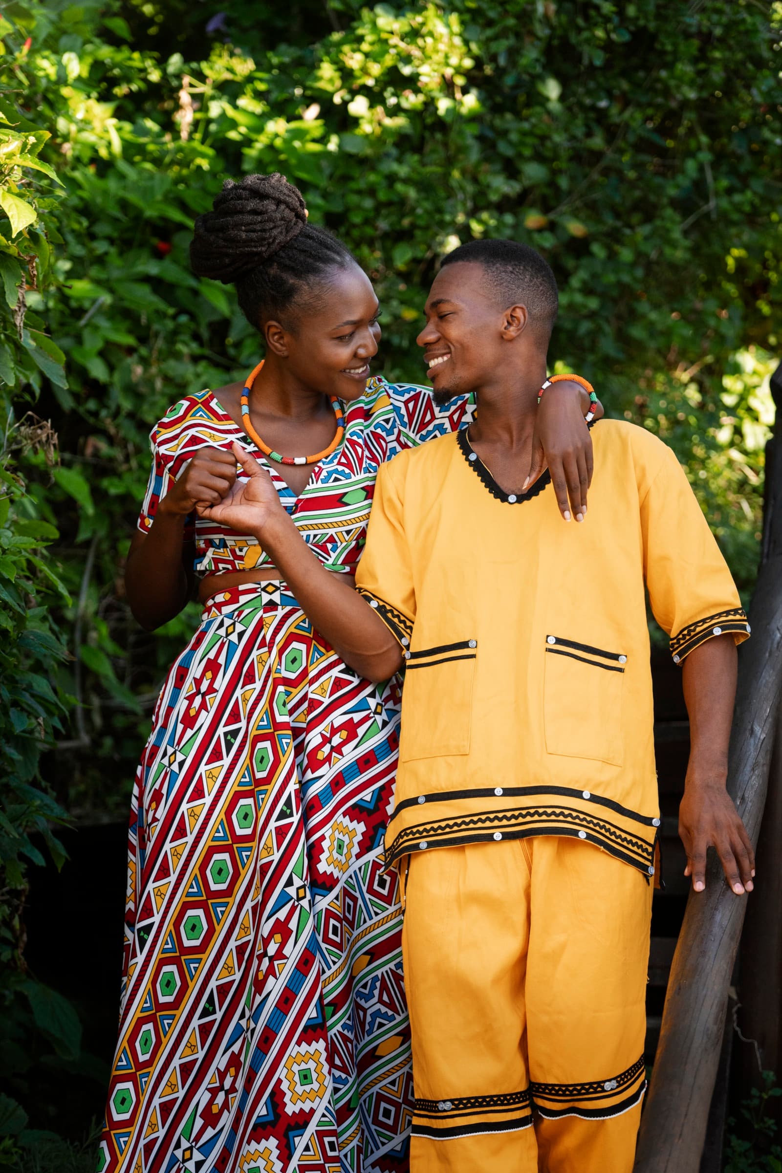 A couple in matching native attire on their traditional marriage day